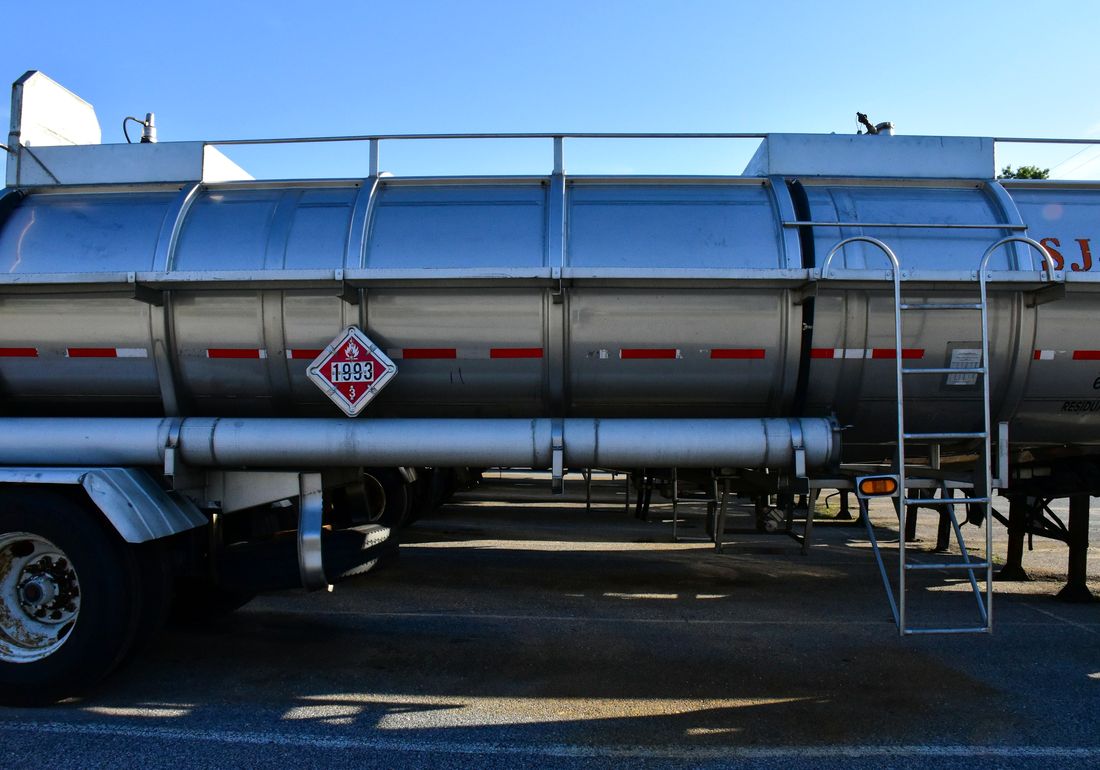 Road tanker positioned for an on-site fuel delivery
